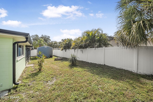 view of yard with a storage shed