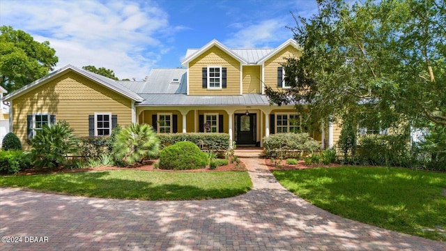 view of front of property with a front lawn and a porch