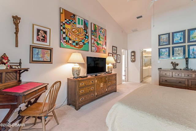 67 Kingsley Ln, Ormond Beach, FL 32174 - bedroom featuring light colored carpet, ensuite bath, baseboards, a towering ceiling, and visible vents