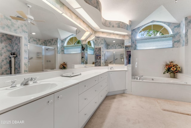 67 Kingsley Ln, Ormond Beach, FL 32174 - full bath with double vanity, a shower stall, a sink, and lofted ceiling