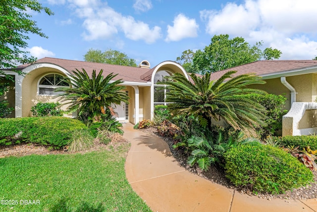 67 Kingsley Ln, Ormond Beach, FL 32174 - view of front of property with stucco siding