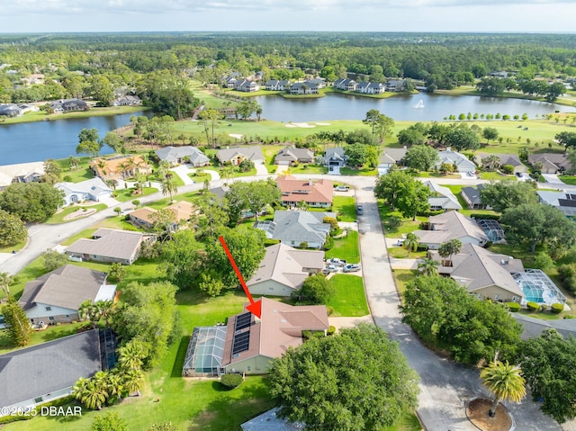 67 Kingsley Ln, Ormond Beach, FL 32174 - drone / aerial view featuring a water view, a view of trees, a residential view, and golf course view