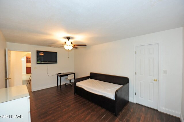1889 Seclusion Dr, Port Orange, FL 32128 - sitting room featuring wood finished floors, a ceiling fan, and baseboards