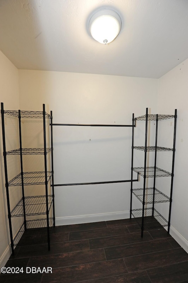 1889 Seclusion Dr, Port Orange, FL 32128 - walk in closet with dark wood-type flooring