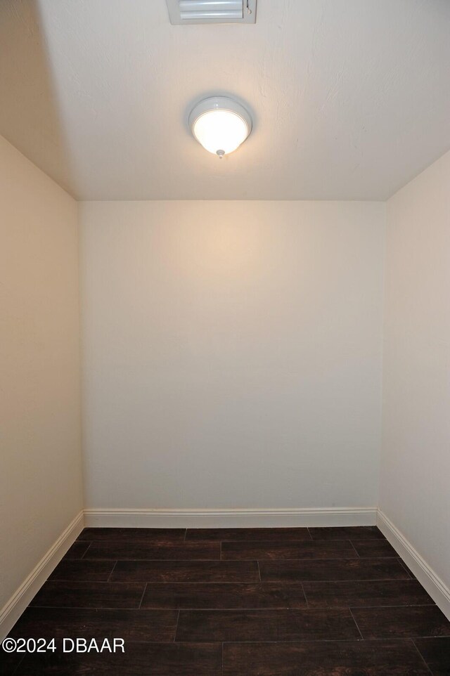 1889 Seclusion Dr, Port Orange, FL 32128 - empty room featuring baseboards and dark wood-style flooring