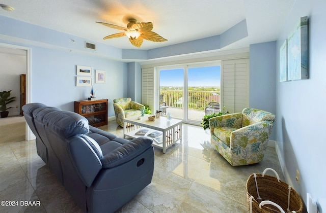 living room with ceiling fan