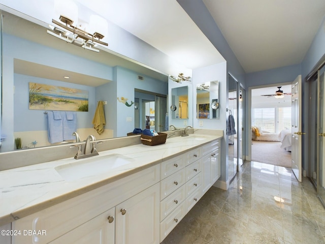 bathroom with vanity and ceiling fan