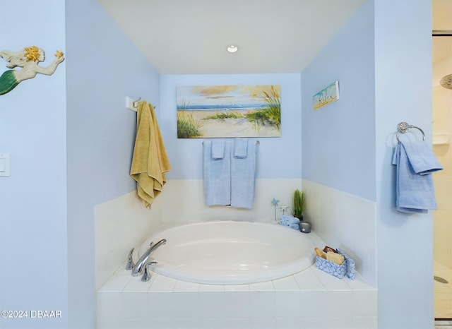 bathroom featuring separate shower and tub