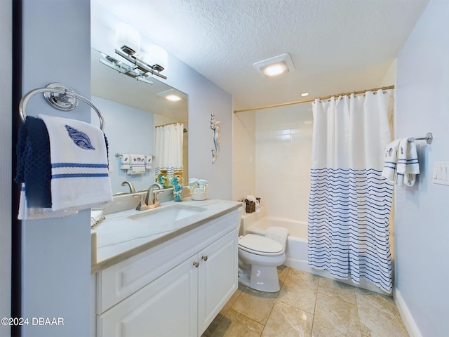 full bathroom featuring vanity, a textured ceiling, toilet, and shower / tub combo