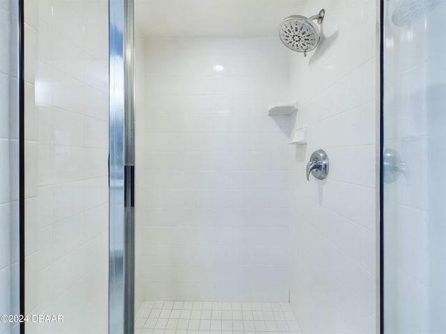 bathroom featuring an enclosed shower