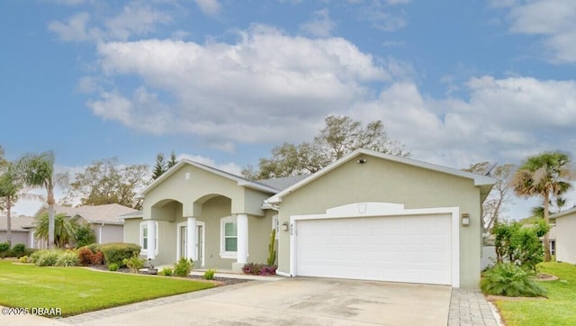 ranch-style home with a garage and a front yard