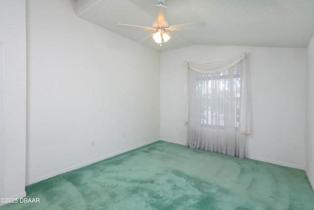 149 Gala Cir, Daytona Beach, FL 32124 - carpeted empty room with lofted ceiling, baseboards, a ceiling fan, and a textured ceiling