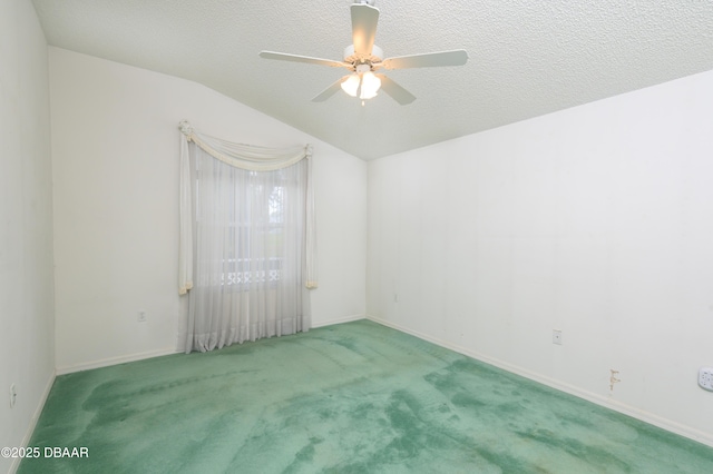 149 Gala Cir, Daytona Beach, FL 32124 - carpeted spare room featuring ceiling fan, vaulted ceiling, baseboards, and a textured ceiling