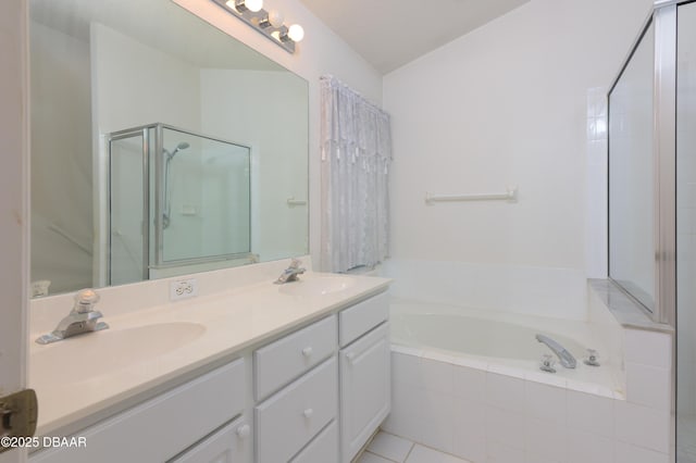 149 Gala Cir, Daytona Beach, FL 32124 - full bathroom featuring a stall shower, a garden tub, double vanity, and tile patterned flooring