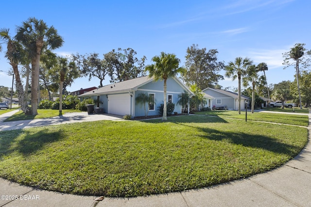 ranch-style home with a front yard and a garage