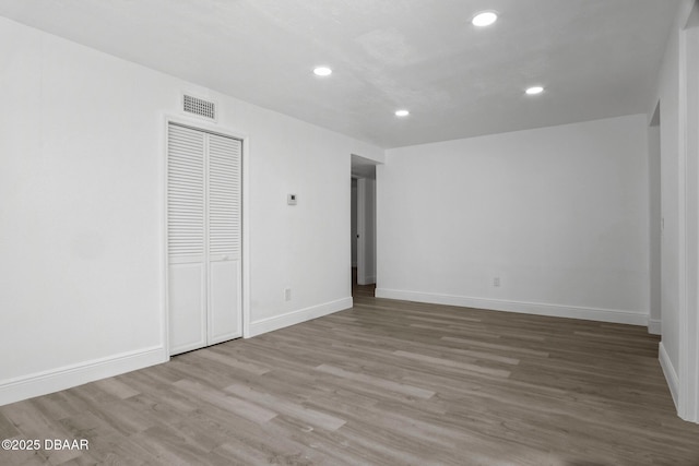 1324 Powers Ave, Holly Hill, FL 32117 - unfurnished room featuring recessed lighting and wood finished floors