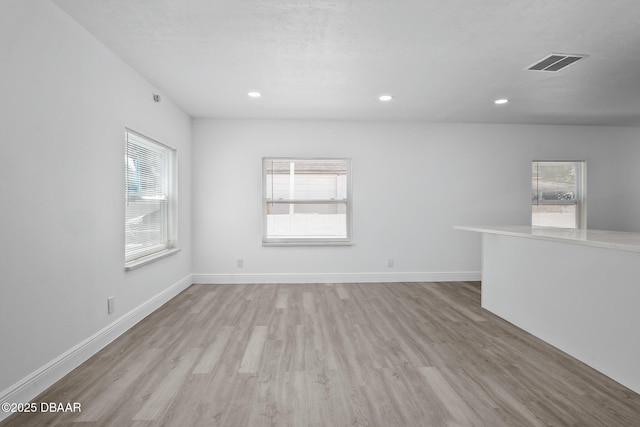 1324 Powers Ave, Holly Hill, FL 32117 - spare room with light wood-style floors and recessed lighting
