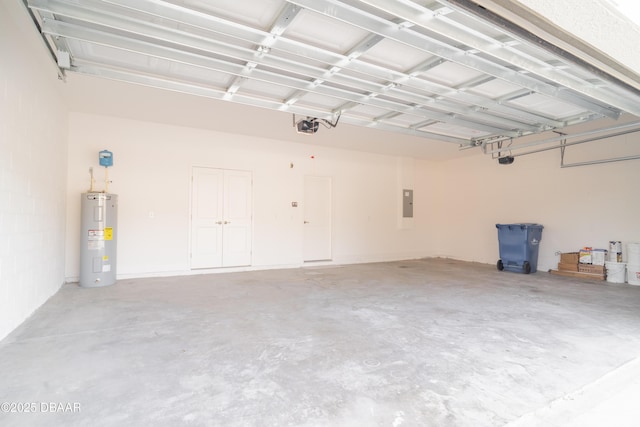 garage featuring a garage door opener, electric panel, and electric water heater