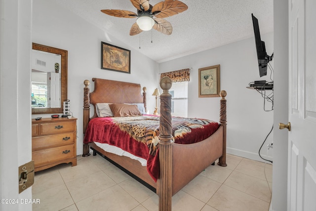316 Dahoon Holly Dr, Daytona Beach, FL 32117 - bedroom with a textured ceiling, light tile patterned flooring, and ceiling fan