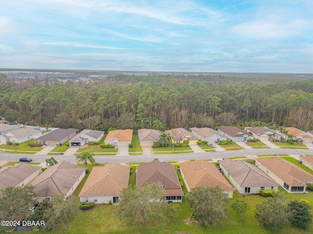 316 Dahoon Holly Dr, Daytona Beach, FL 32117 - aerial view of property and surrounding area featuring nearby suburban area and a forest