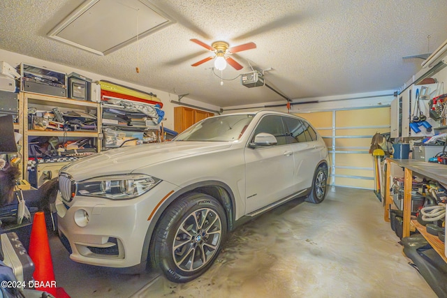316 Dahoon Holly Dr, Daytona Beach, FL 32117 - garage with a garage door opener and ceiling fan