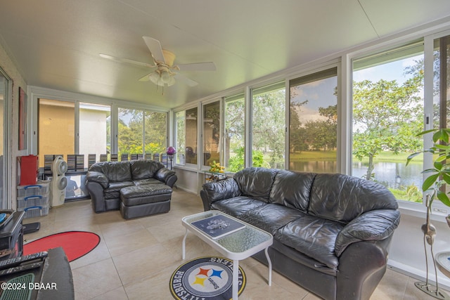 316 Dahoon Holly Dr, Daytona Beach, FL 32117 - sunroom / solarium featuring plenty of natural light, a water view, and tile patterned flooring