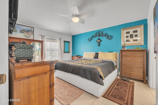 316 Dahoon Holly Dr, Daytona Beach, FL 32117 - bedroom featuring a textured ceiling, light tile patterned floors, and ceiling fan