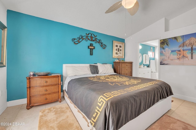 316 Dahoon Holly Dr, Daytona Beach, FL 32117 - tiled bedroom featuring lofted ceiling, connected bathroom, baseboards, and a ceiling fan