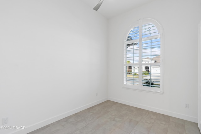 unfurnished room featuring ceiling fan