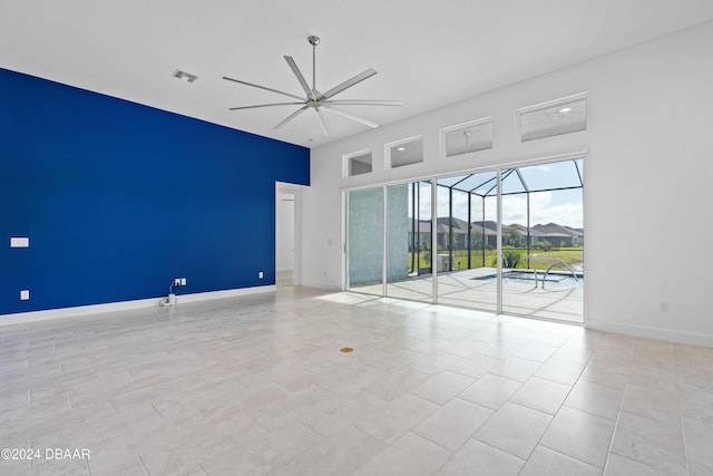 spare room with ceiling fan