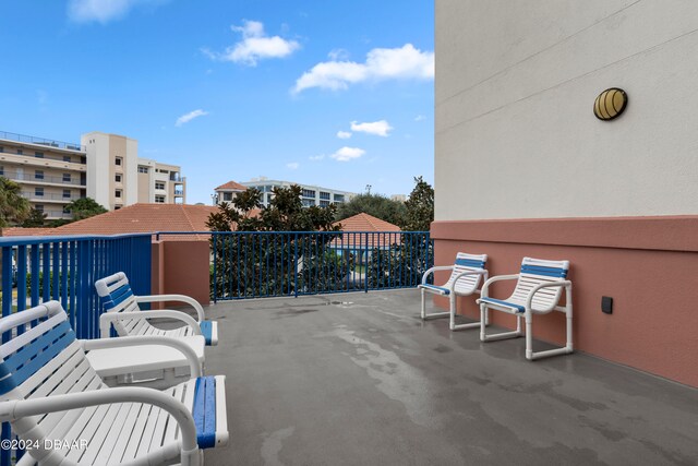 view of patio / terrace with a balcony