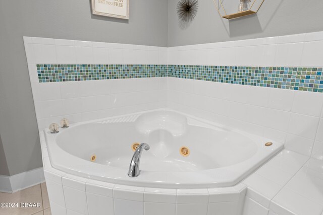 bathroom featuring tiled bath