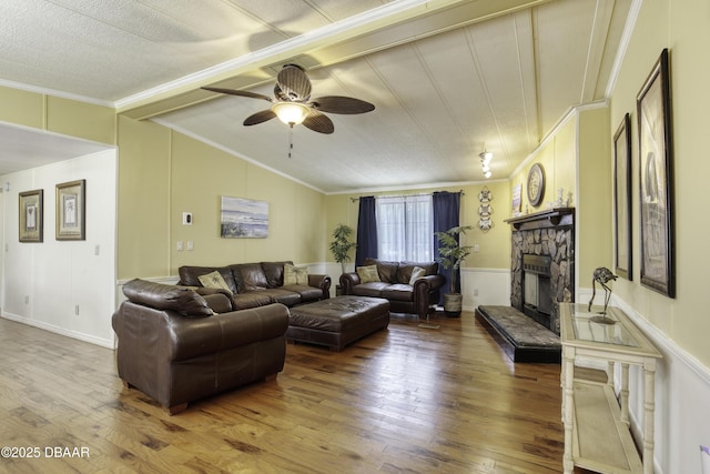 1420 Carol Lee St, Daytona Beach, FL 32117 - living area featuring ornamental molding, wood-type flooring, a fireplace, and ceiling fan