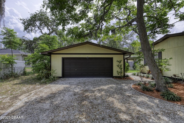 1420 Carol Lee St, Daytona Beach, FL 32117 - garage featuring gravel driveway