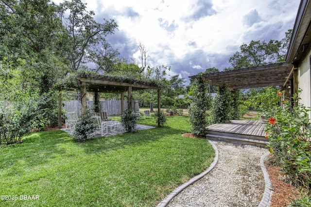 1420 Carol Lee St, Daytona Beach, FL 32117 - view of yard featuring a pergola, a wooden deck, and a patio area