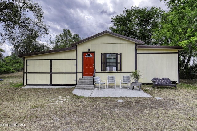 1420 Carol Lee St, Daytona Beach, FL 32117 - ranch-style house with cooling unit and entry steps