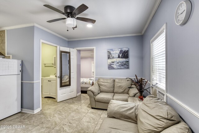 1420 Carol Lee St, Daytona Beach, FL 32117 - living room featuring plenty of natural light, ornamental molding, a ceiling fan, and baseboards