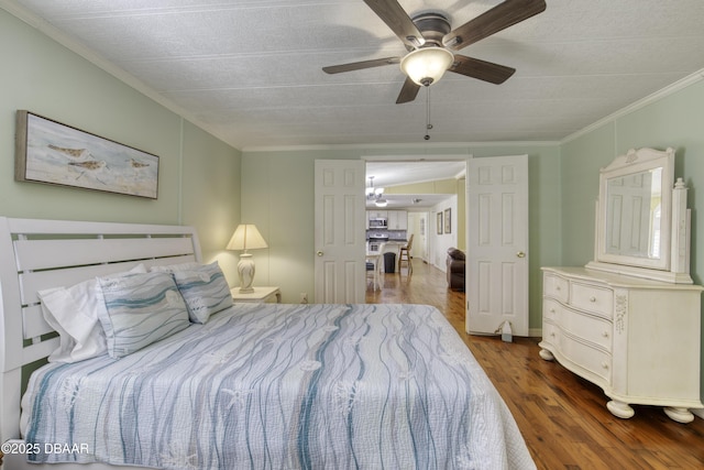 1420 Carol Lee St, Daytona Beach, FL 32117 - bedroom featuring dark wood-style floors, ornamental molding, and a ceiling fan