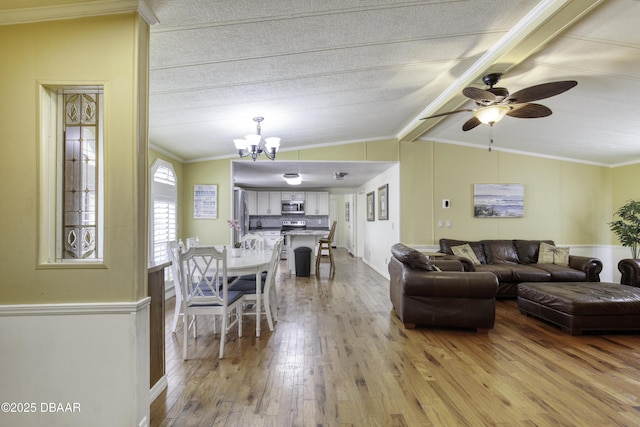 1420 Carol Lee St, Daytona Beach, FL 32117 - living area featuring light wood finished floors, crown molding, a chandelier, and ceiling fan