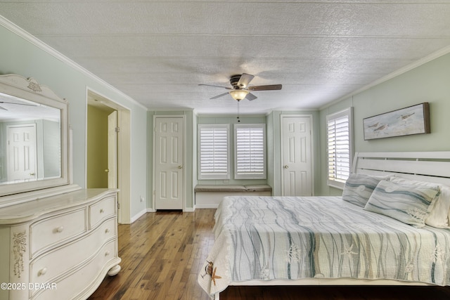 1420 Carol Lee St, Daytona Beach, FL 32117 - bedroom featuring wood-type flooring, crown molding, baseboards, a textured ceiling, and a ceiling fan