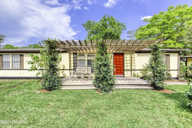 1420 Carol Lee St, Daytona Beach, FL 32117 - back of house featuring a pergola and a yard