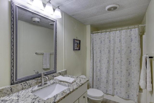 1420 Carol Lee St, Daytona Beach, FL 32117 - full bathroom with vanity, toilet, and shower / bath combo with shower curtain