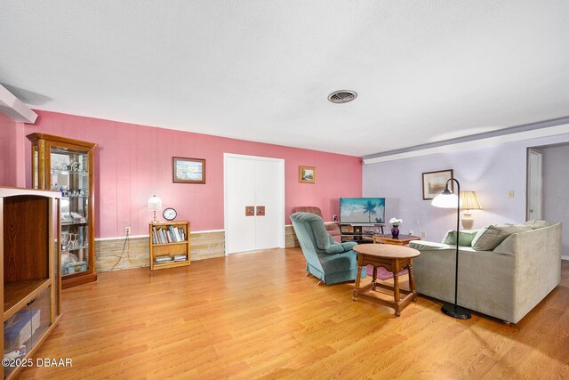 22 N St Andrews Dr, Ormond Beach, FL 32174 - living area with light wood-style flooring