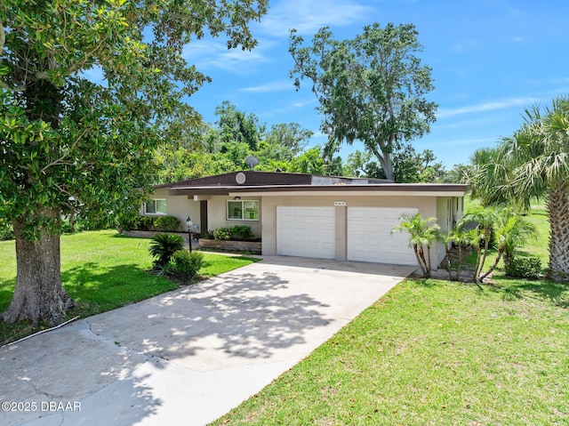 22 N St Andrews Dr, Ormond Beach, FL 32174 - ranch-style home with a garage, concrete driveway, and a front yard
