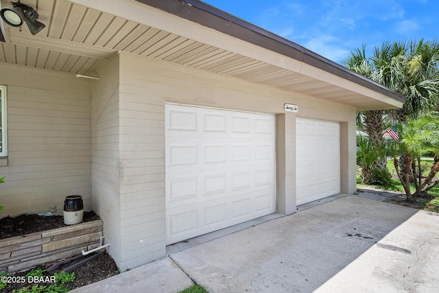 22 N St Andrews Dr, Ormond Beach, FL 32174 - garage featuring driveway