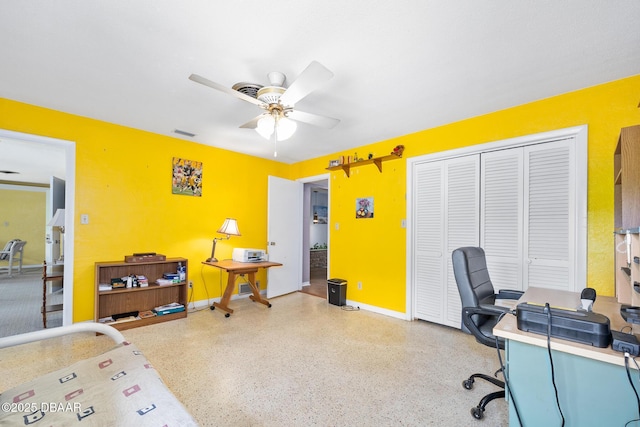 22 N St Andrews Dr, Ormond Beach, FL 32174 - home office with ceiling fan and speckle patterned floor