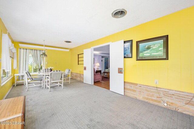 22 N St Andrews Dr, Ormond Beach, FL 32174 - dining room with carpet flooring