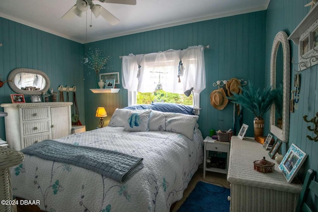 bedroom with ceiling fan and ornamental molding