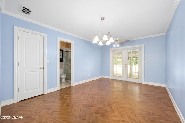 1650 Riverside Dr, Holly Hill, FL 32117 - unfurnished room with french doors, a chandelier, and ornamental molding