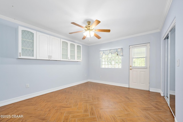 1650 Riverside Dr, Holly Hill, FL 32117 - unfurnished room featuring ceiling fan and crown molding
